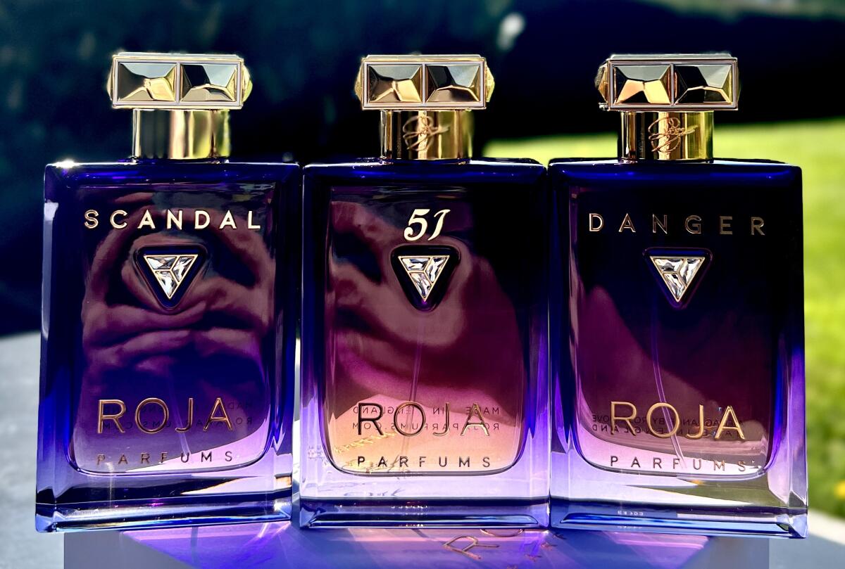 تصویر عطر دنجر پور فم اسنس د پارفوم روژا داو