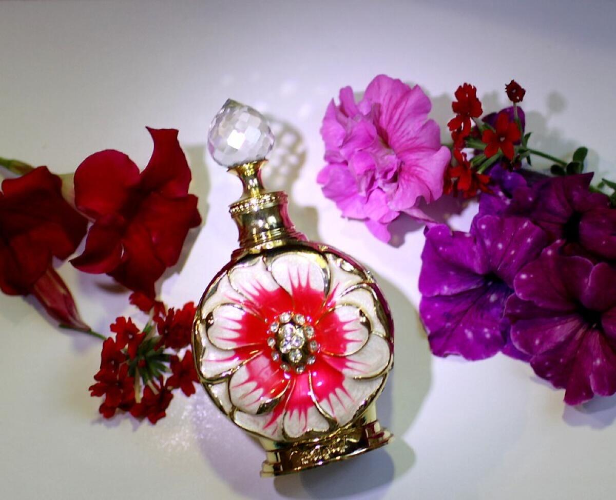 تصویر عطر لیالی روژ سوئیس عربین