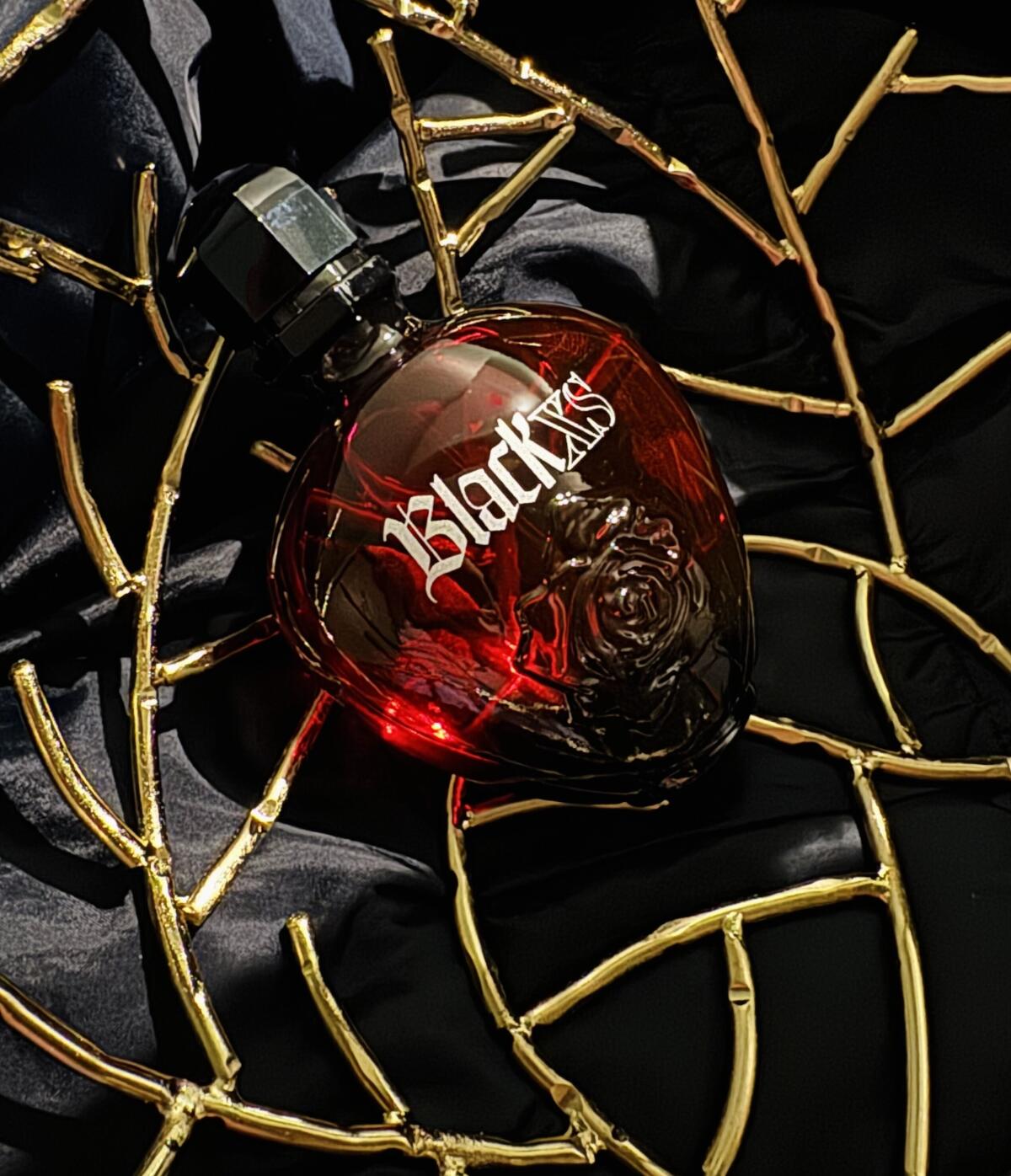 تصویر عطر بِلَک اکس‌اس فور هر رابان