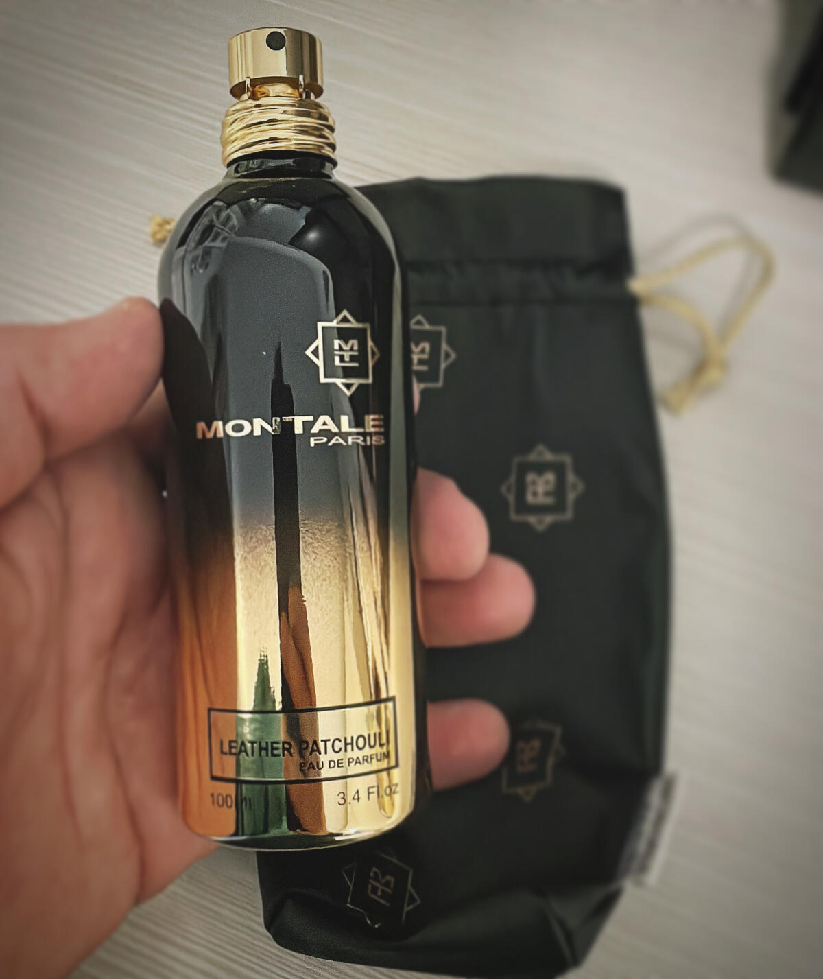 تصویر عطر لدر پچولی مونتال