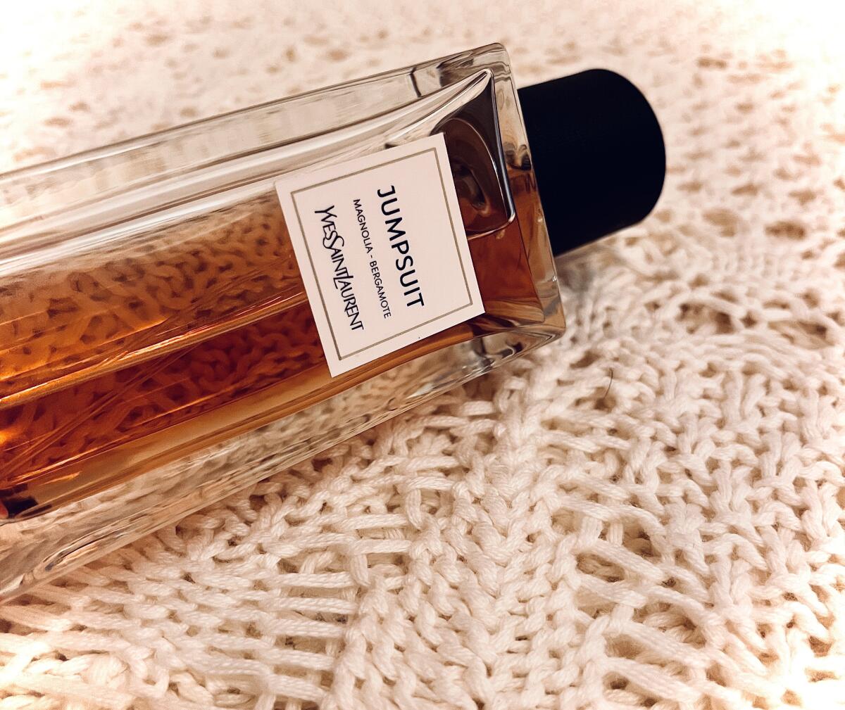 عطر ادکلن جامپ‌سوت ایو سن لوران - Jumpsuit Yves Saint Laurent - بررسی، قیمت و خرید