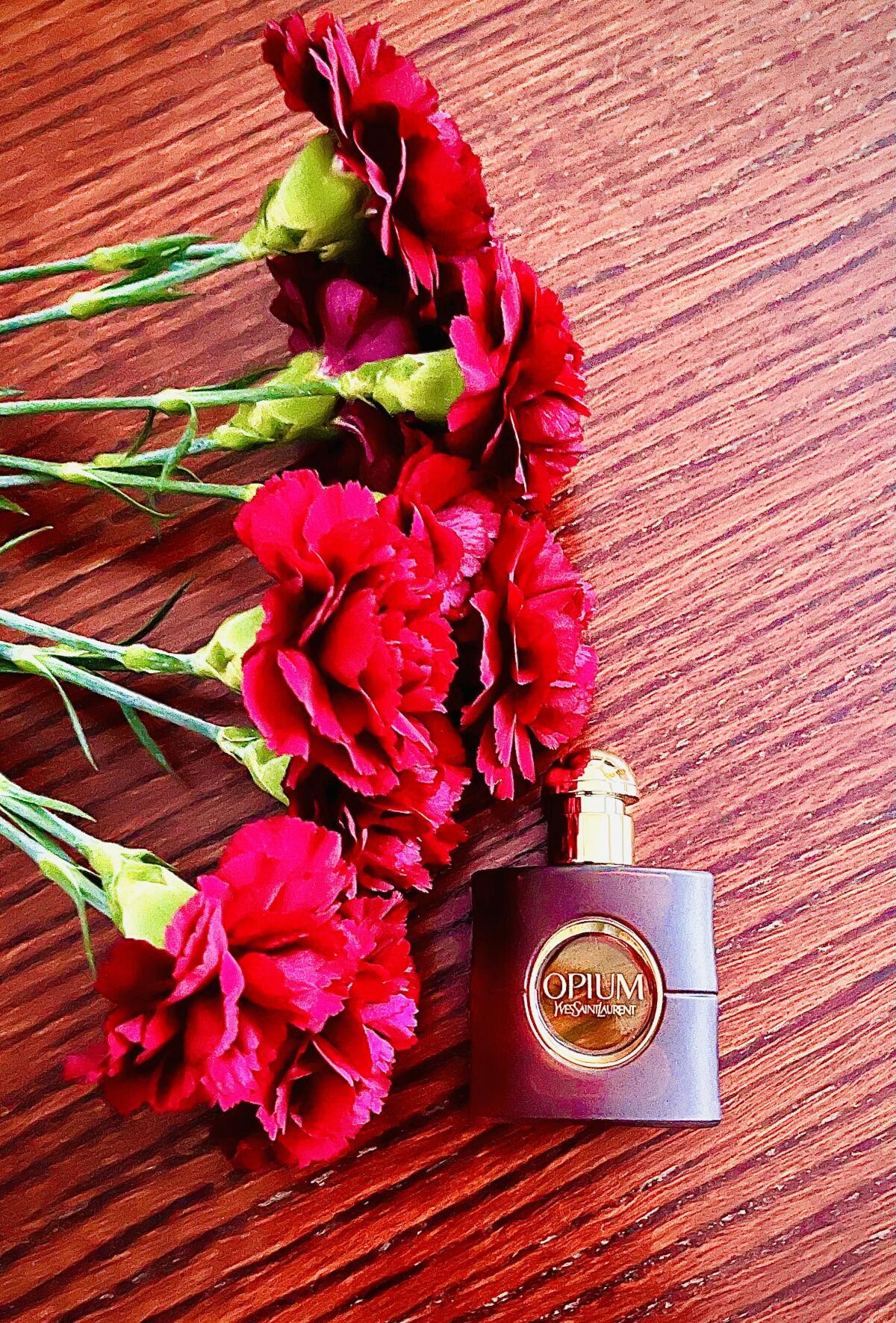 عطر ادکلن اوپیوم او د تویلت ایو سن لورن - Opium Eau de Toilette 2009 Yves Saint Laurent - بررسی، قیمت و خرید