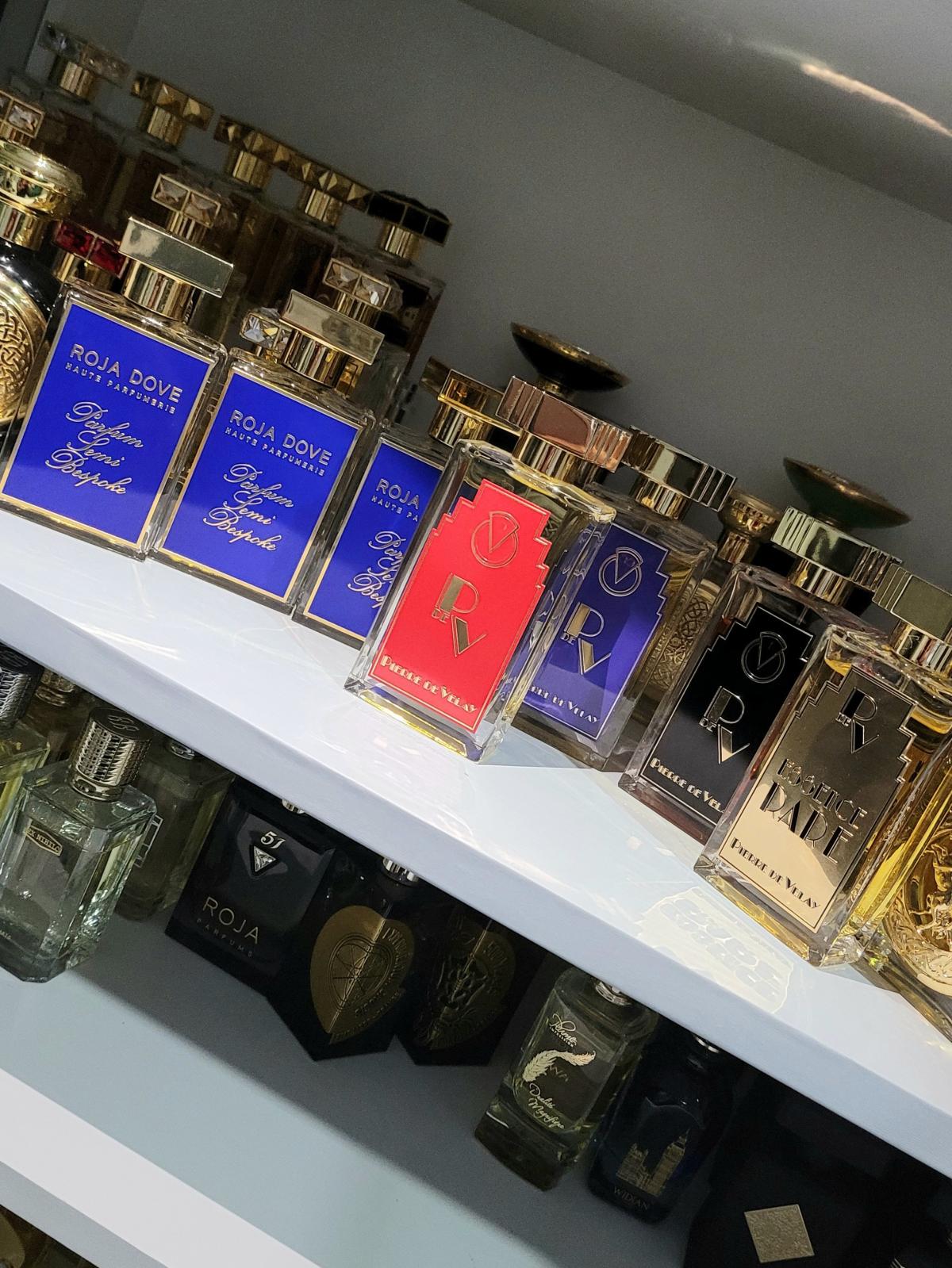 عطر ادکلن اسنس رر روجا داو - Essence Rare Roja Dove - بررسی، قیمت و خرید