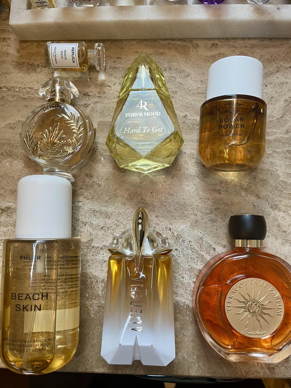 عطر ادکلن بـیچ واک مزون مارتین مارژیلا - Beach Walk Maison Martin Margiela - بررسی، قیمت و خرید