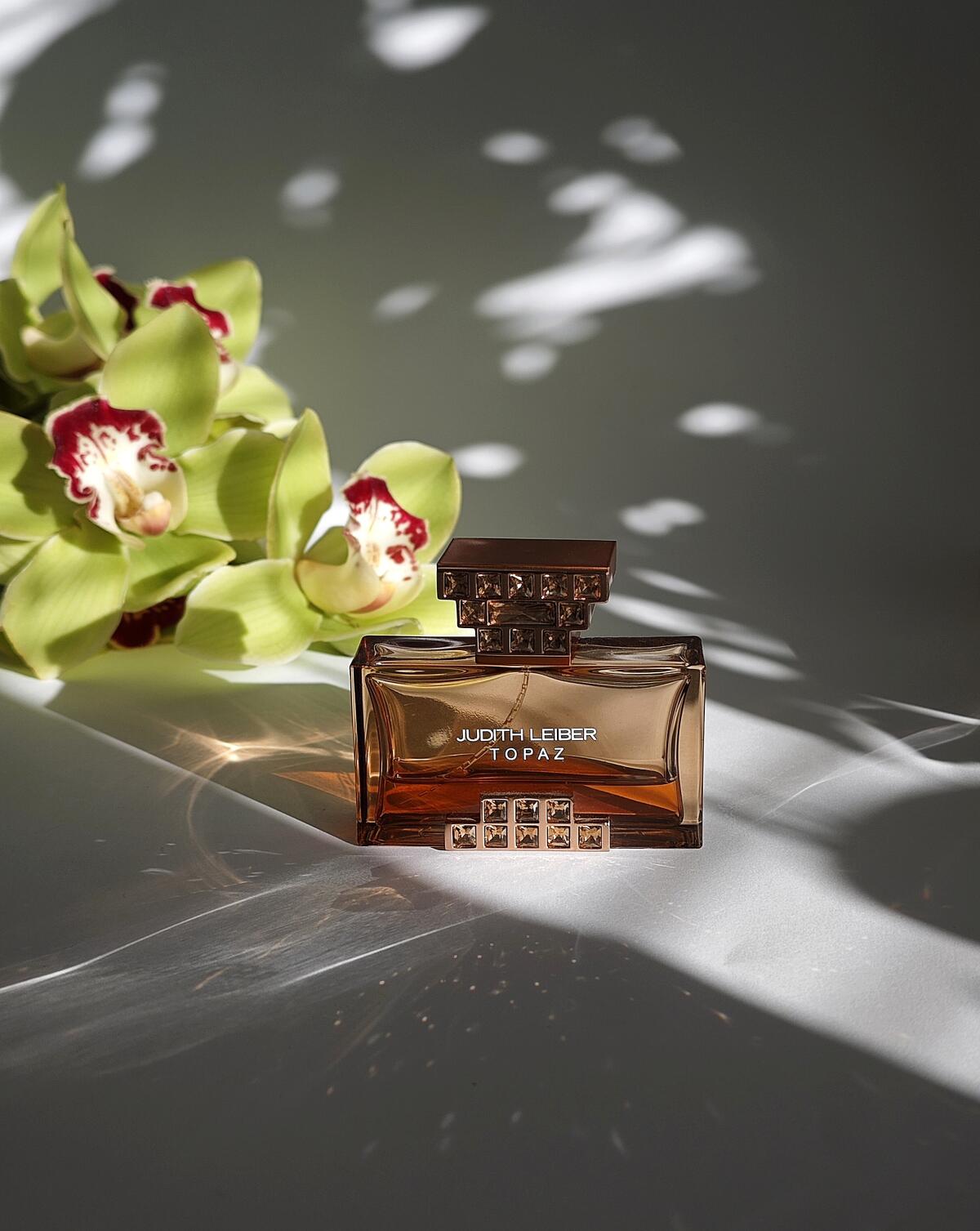عطر ادکلن تاپاز جودیت لیبر - Topaz Judith Leiber - بررسی، قیمت و خرید
