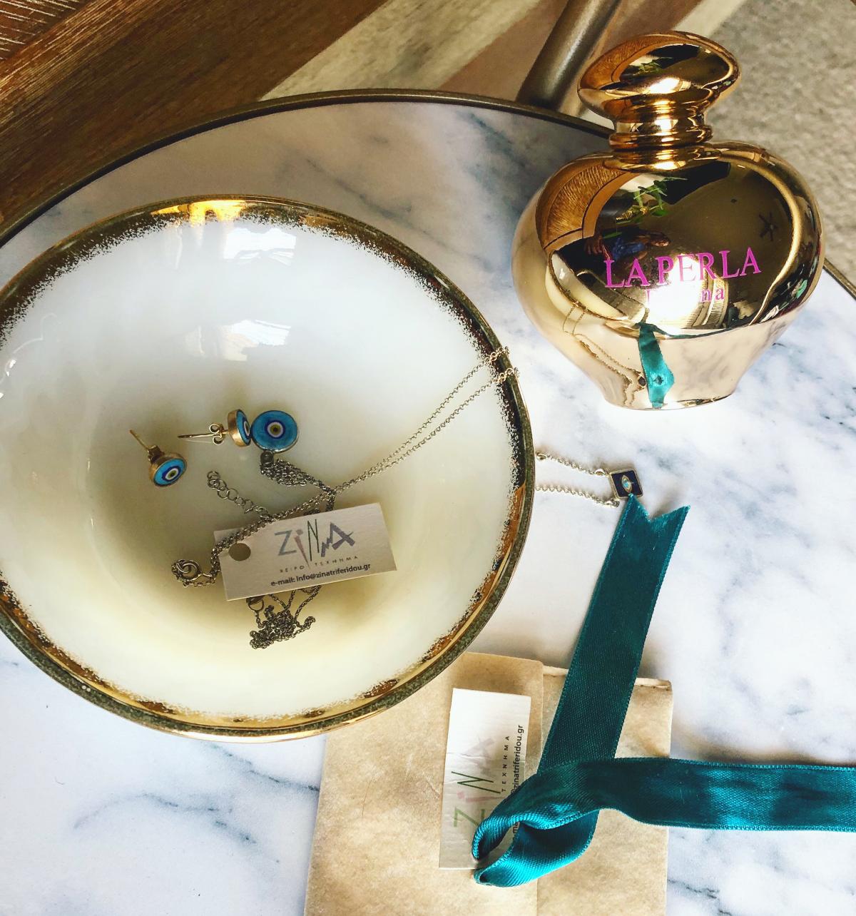 عطر ادکلن دیوینا گلد ادیشن لا پرلا - Divina Gold Edition La Perla - بررسی، قیمت و خرید