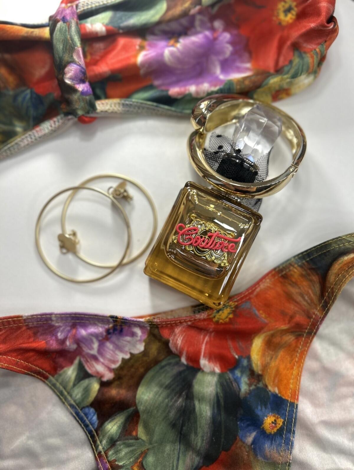 عطر ادکلن ویوا لا جوسی گلد کوتور جوسی کوتور - Viva la Juicy Gold Couture Juicy Couture - بررسی، قیمت و خرید