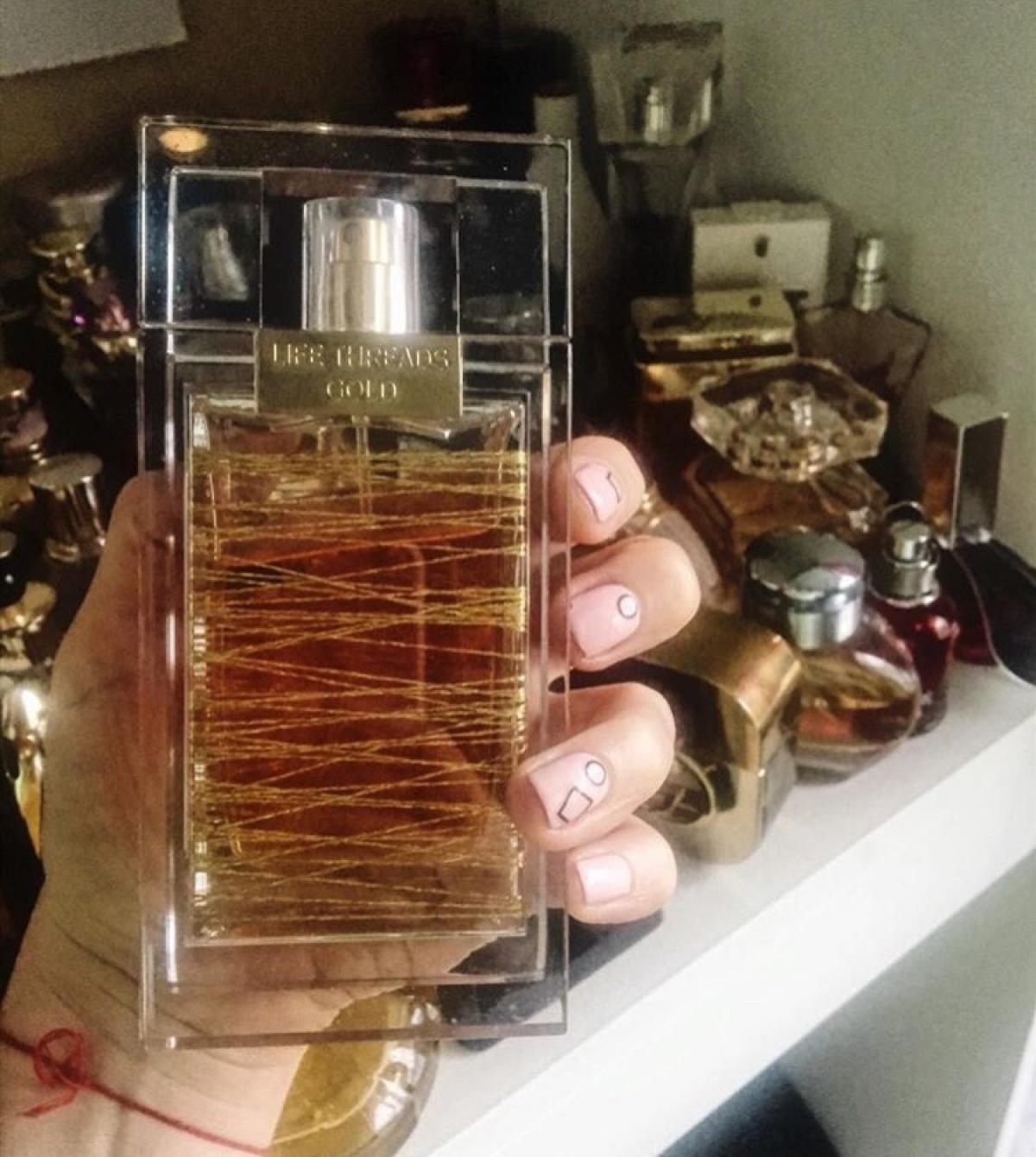 عطر ادکلن لایف تردز گلد لا پری - Life Threads Gold La Prairie - بررسی، قیمت و خرید