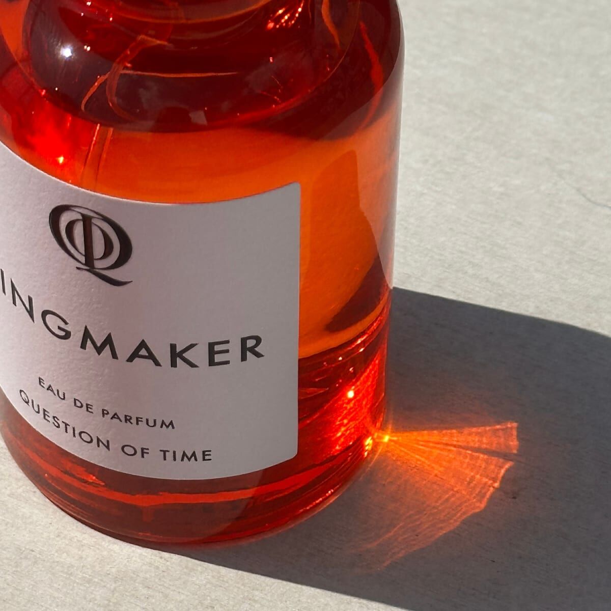 عطر ادکلن کینگ‌میکر کوات - Kingmaker QOT - Question of Time - بررسی، قیمت و خرید