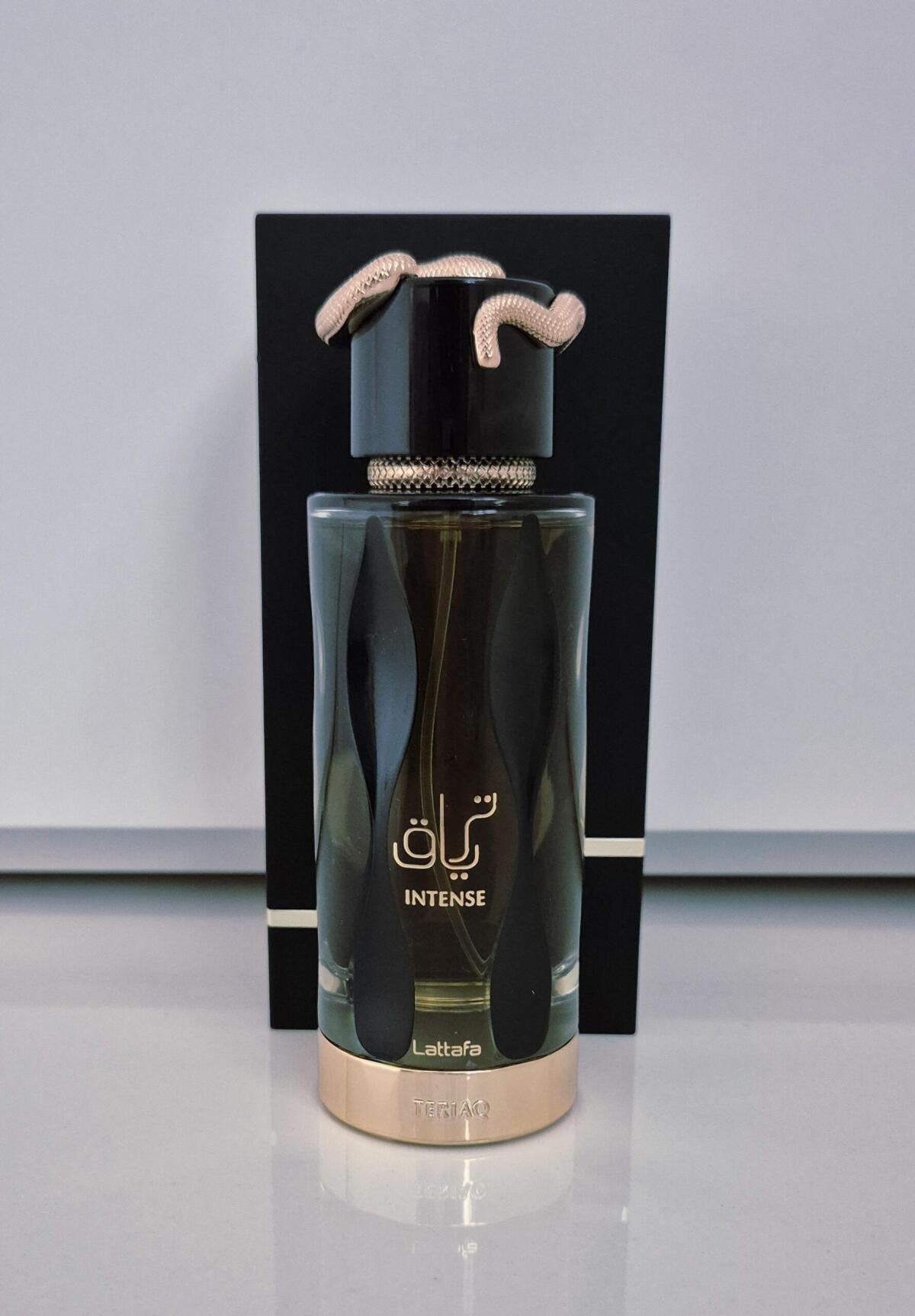 عطر ادکلن تریاک اینتنس لتافا پرفیومز - Teriaq Intense Lattafa Perfumes - بررسی، قیمت و خرید
